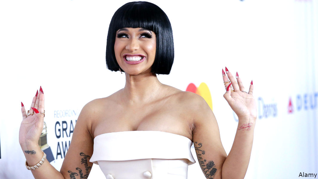 Most simultaneous Billboard US Hot 100 entries by a female