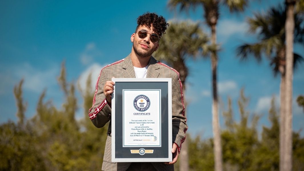 Prince Royce certificate presentation
