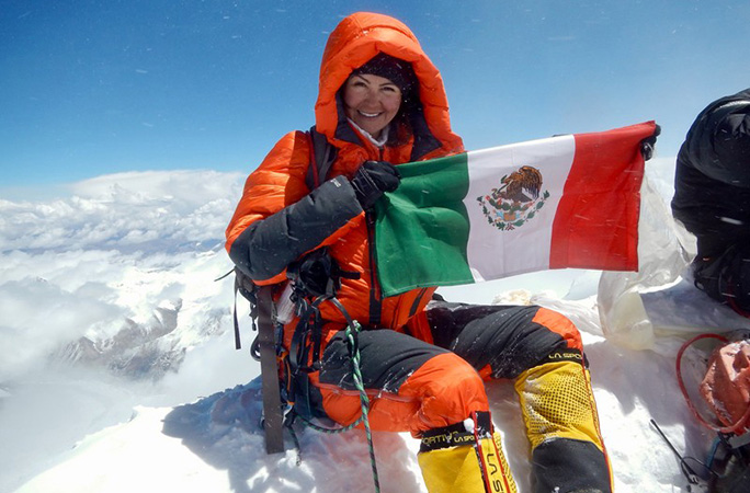 Viridiana holding flag