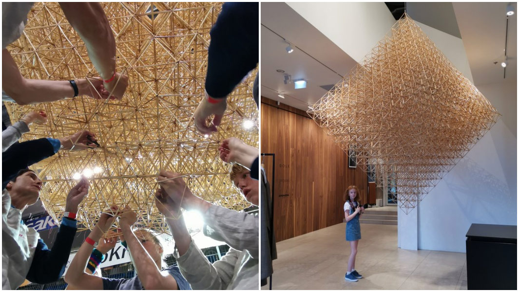 The largest himmeli ornament hanging from the ceiling and during building