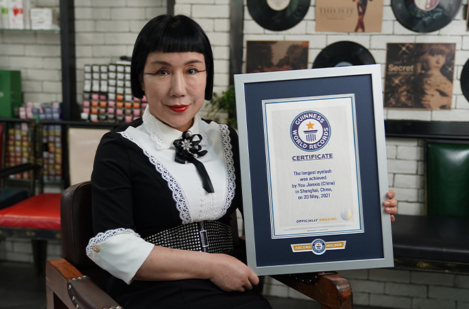 Woman with the world’s longest eyelash breaks own record | Guinness ...