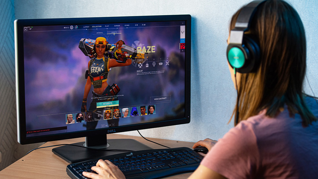 Girl playing Fortnite on PC
