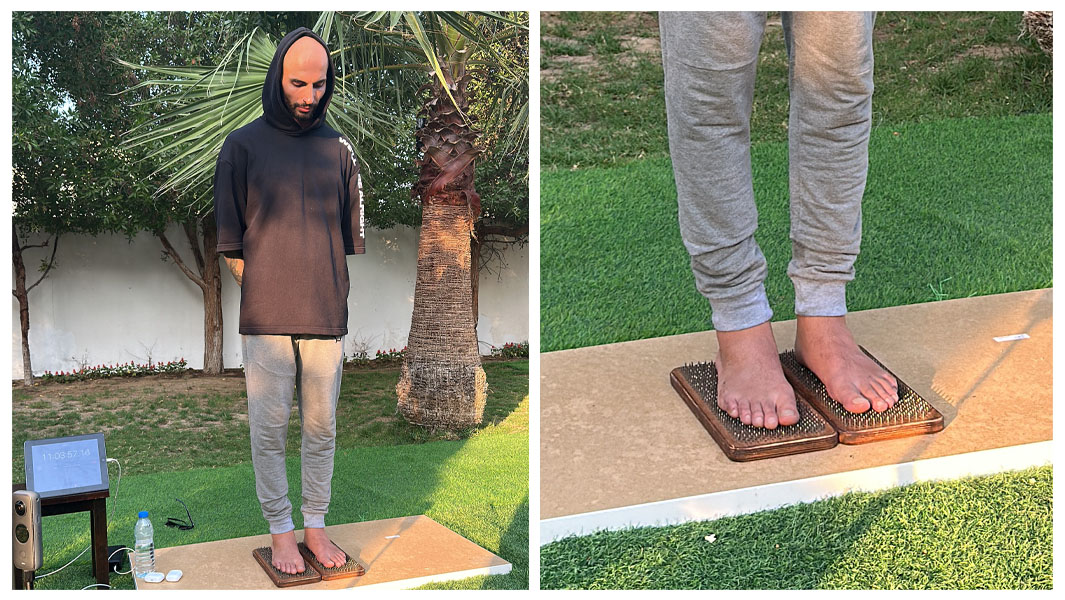 Split image from the attempt for longest duration standing on a nail board