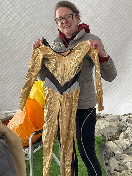 Ellie with suit for performing