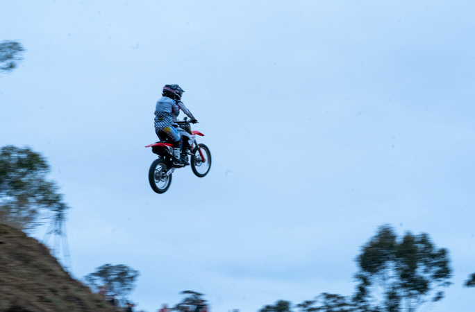 Couple break 20-year record with most dangerous motorbike stunt they've ...