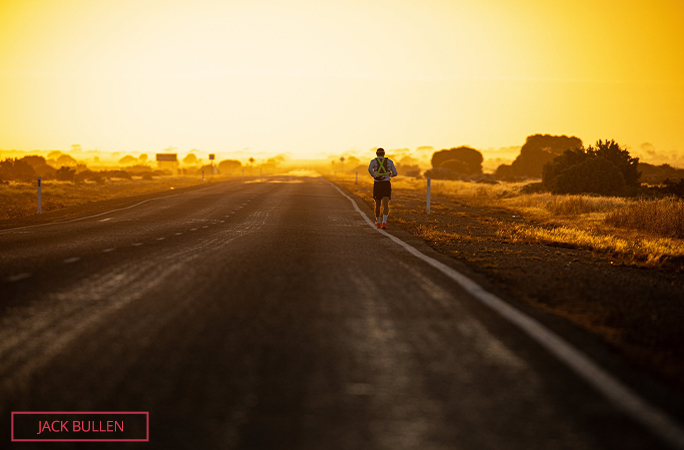 Chris running while the sun is setting