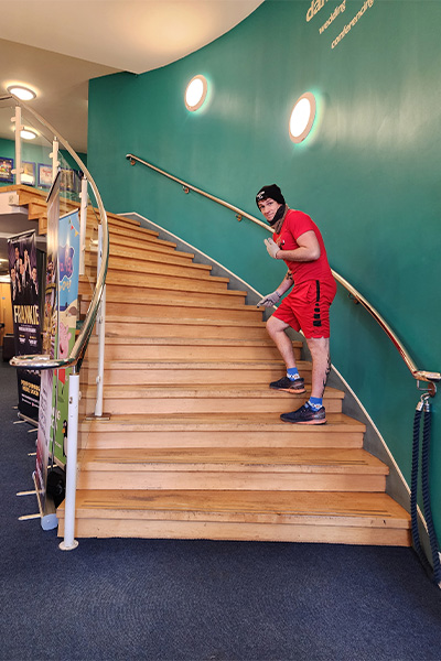 Sean climbing some stairs