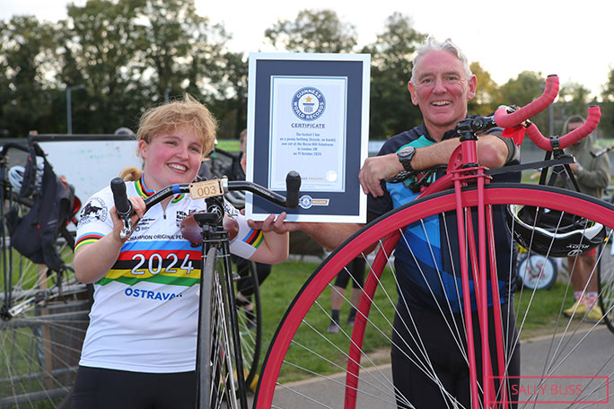 Evi Dumon and Neil Laughton with a certificate