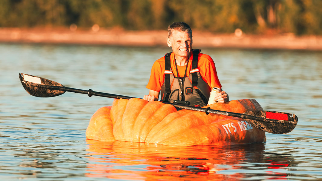 Gary out on the water in his pumpkin boat