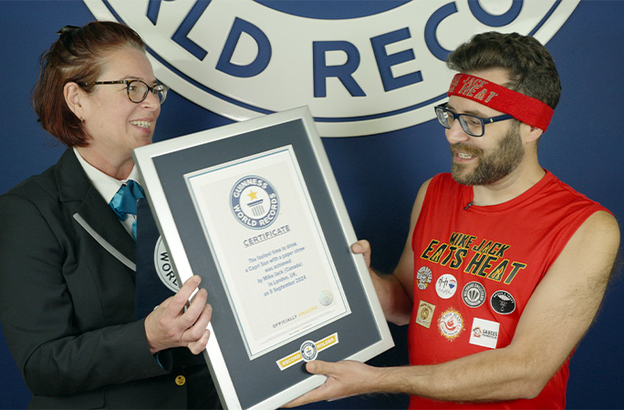 Mike presented with his certificate by Juliet Dawson
