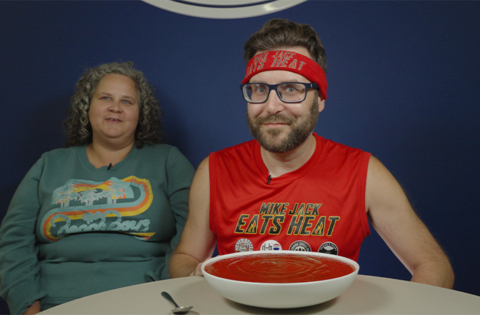 Mike with wife Jamie and a bowl of hot sauce