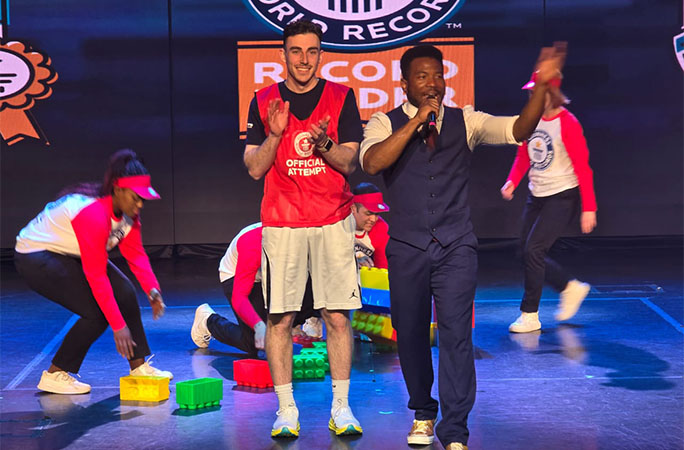MSC passenger on stage with a host