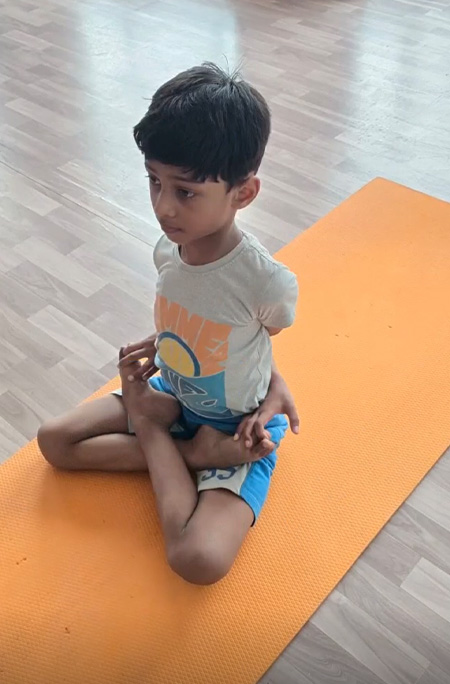 Pratyaksh doing a yoga pose