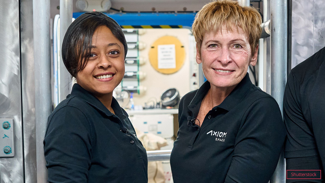 Rayyanah Barnawi with her team inside a spaceship