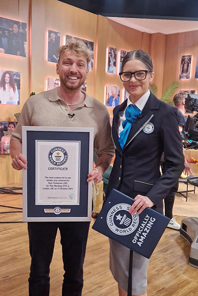 Sam and Adjudicator smiling