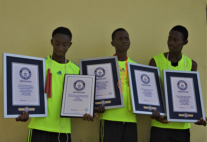 Three record holders with cert