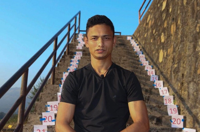 Hari sitting on the stairs