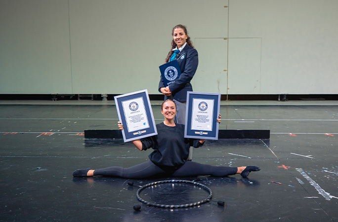 Sara with two of her certificates