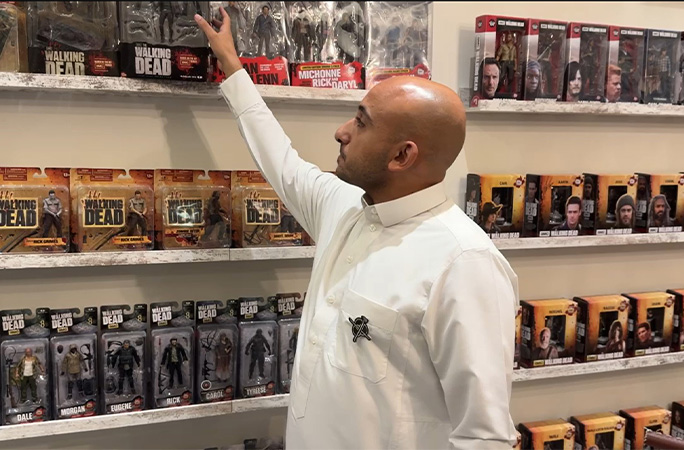 Rashid getting something off the shelf