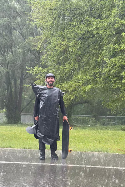 Chad Caruso standing in the rain