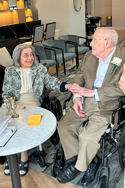 Marjorie and Bernie look lovingly at each other