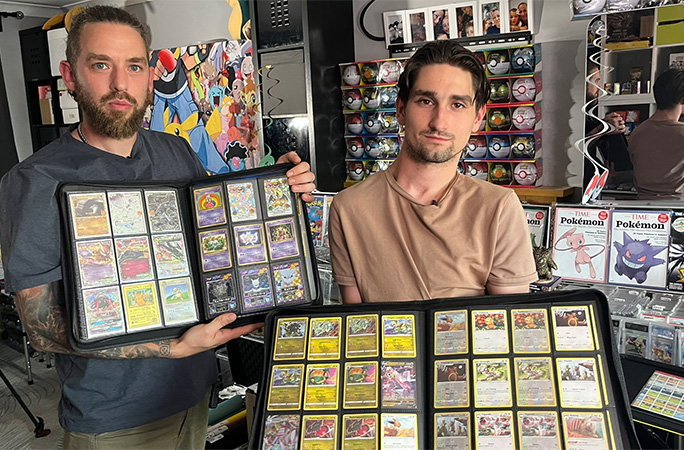 Owen and Conner with folders of cards