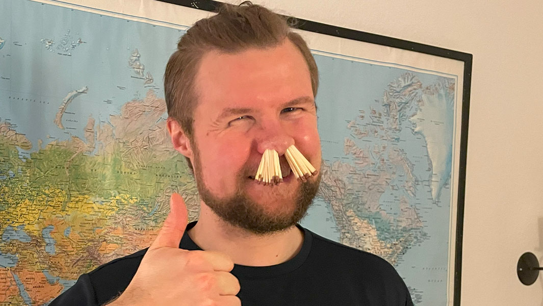 Peter smiling with 68 matches in his nostrils