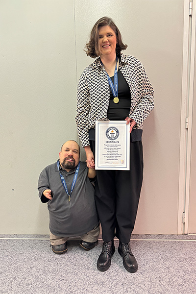 Larry and JEssica pose with GWR certificate