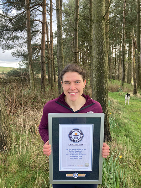 Jasmin with her certificate and forest