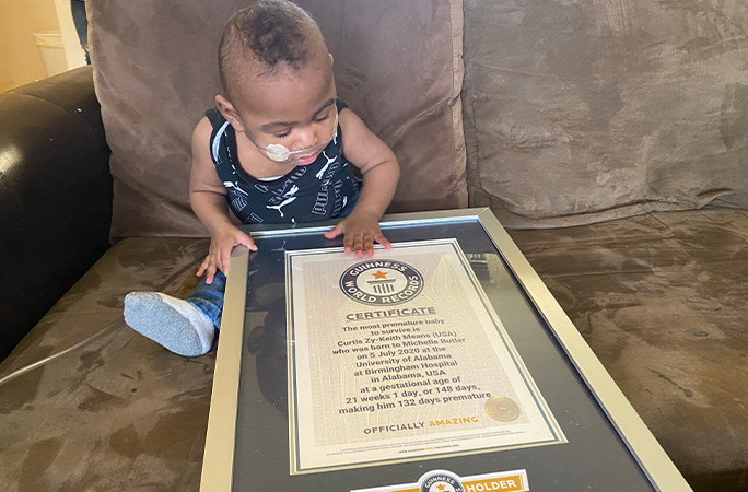 Curtis as a baby with his GWR certificate