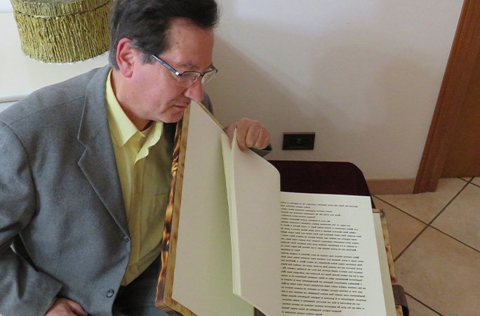 Michele flicking through book pages