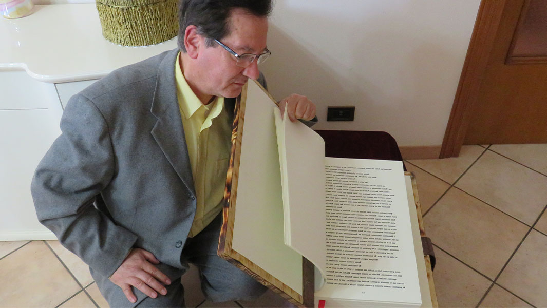 split image of Michele Santelia and his book