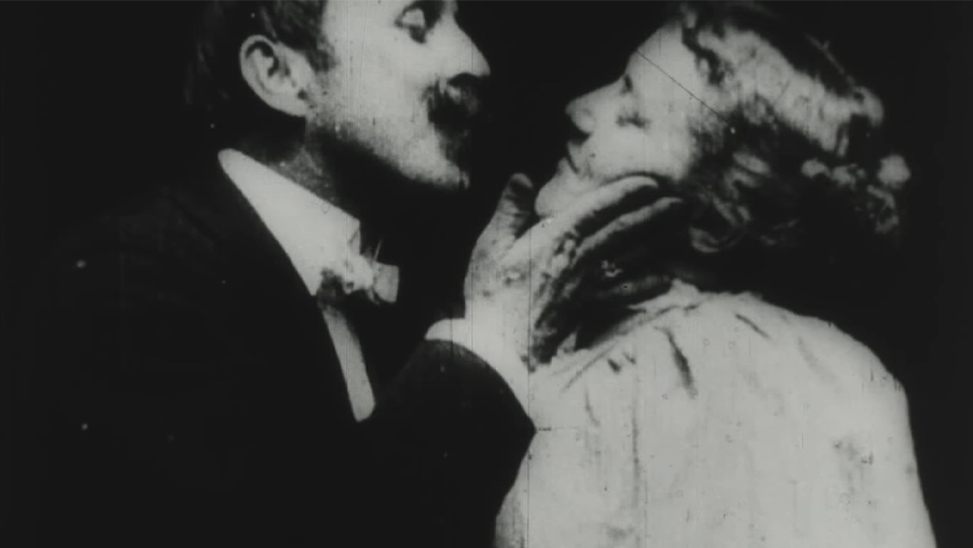 Man leans in for the first screen kiss