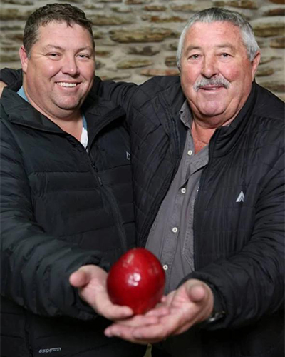 Dean and Deon holding heaviest plum