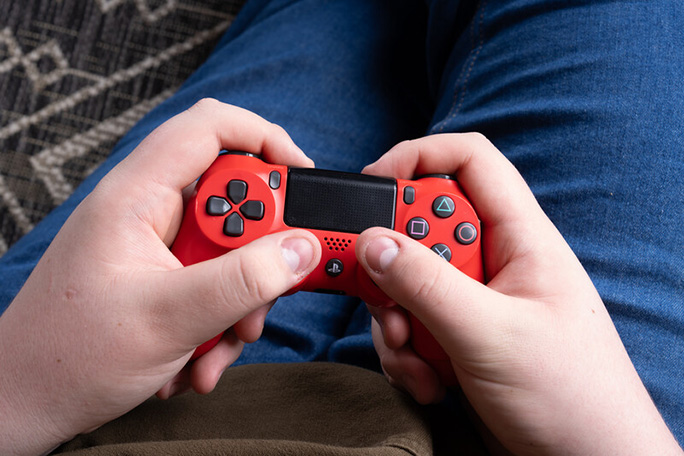 Eric holding a gaming controller