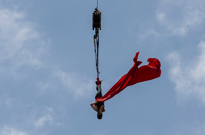 Erika suspended upside down