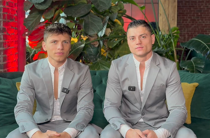 Artan and Arnold sitting together