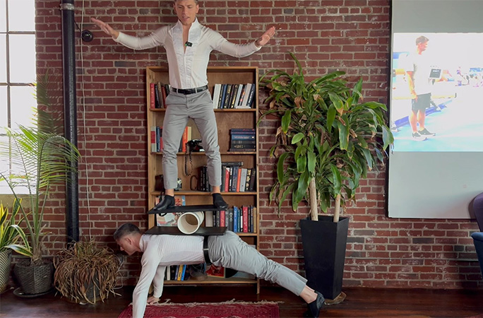 Artan standing on Arnold's back