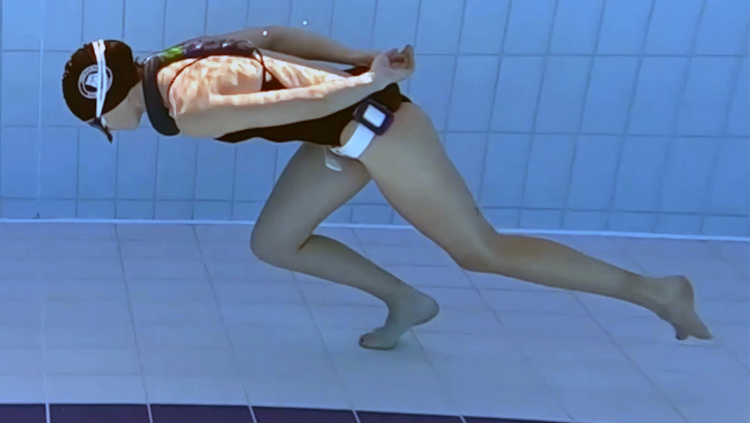 Amber walking underwater