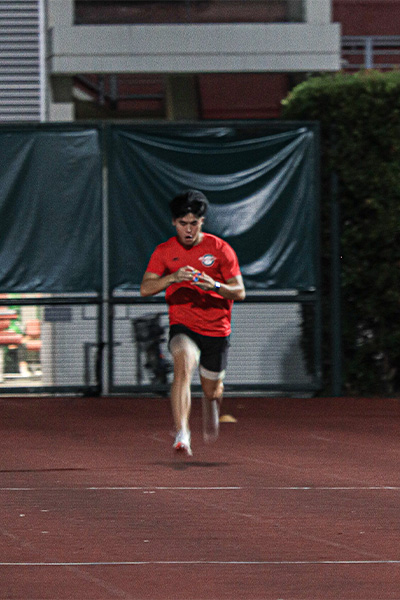 Daryl running and solving a puzzle cube