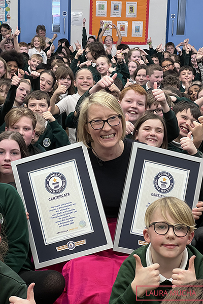 Laura with kids smiling close up