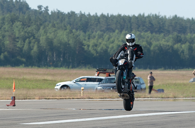 Magnus doing a handlebar wheelie