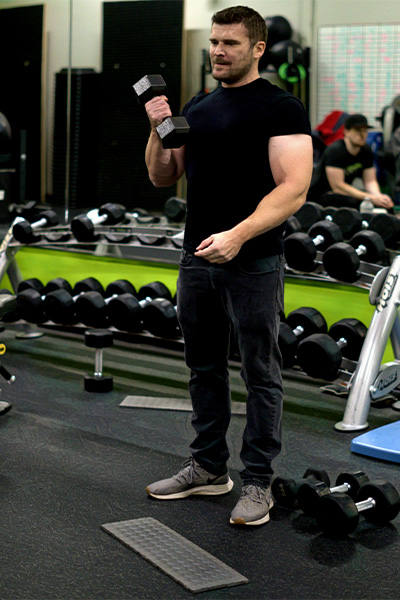 Paul Boland lifting weights