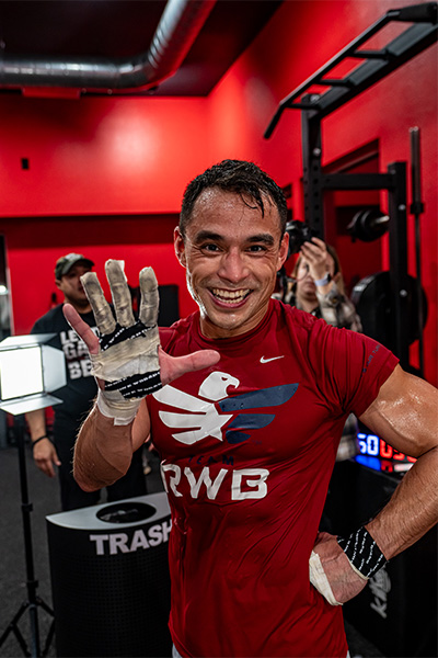 Tommy holding up his hand