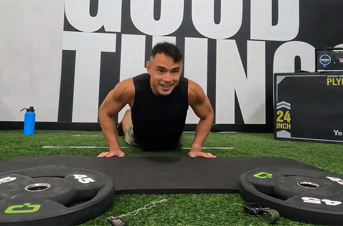 Tommy on the ground mid-burpee