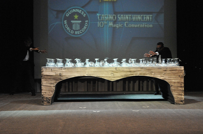 Walter Rolfo and his partner prepare to break glasses with their minds