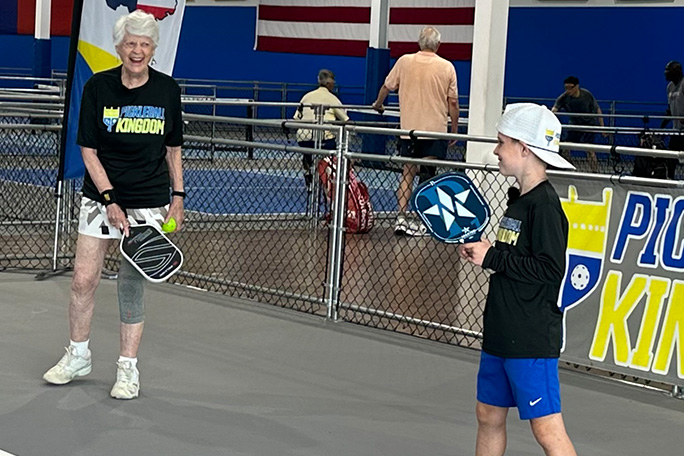 joyce jones with young player at opening of pickleball kingdom in texas