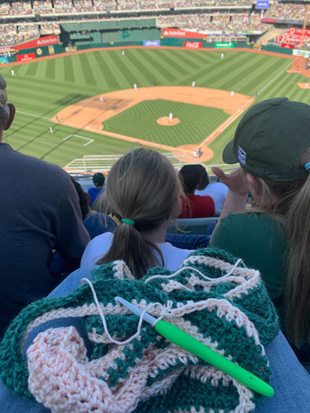 Longest crochet scarf during a football game