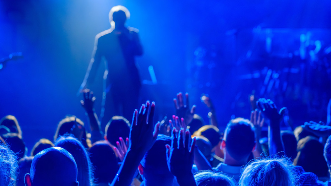 A musician performing for a crowd