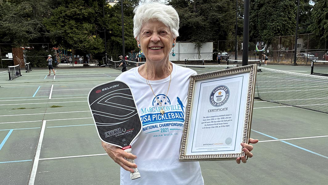 oldest-competitive-pickleball-player-joyce-jones-playing-pickleball-and-holding-medals-in-2024